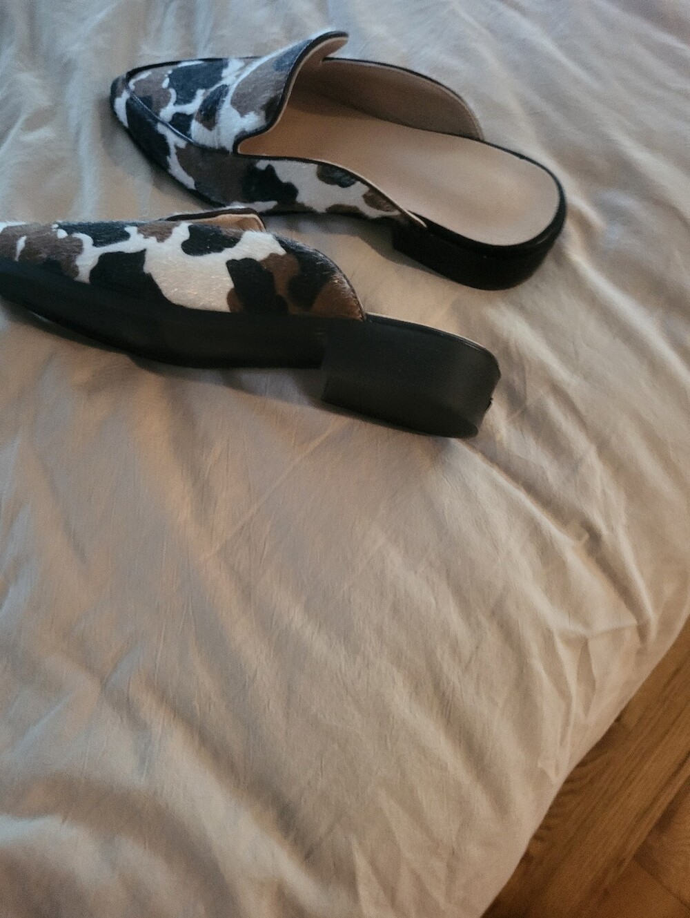 Pointed Toe Cow Print Slip-On Mules - Black & White